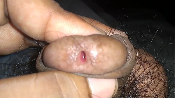 Young Indian boy Ajay showing a penis in the bathroom and playing with it.