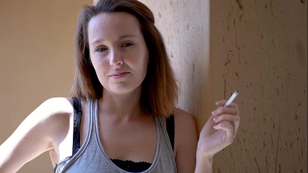 Brunette Smoking Tease with Intense Eye Contact