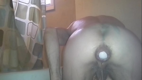 Ping pong balls inserted in ass in bath tub