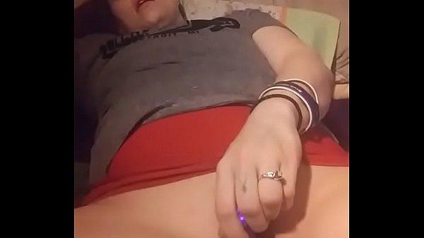 Sexy girl makes herself squirt with a purple dildo