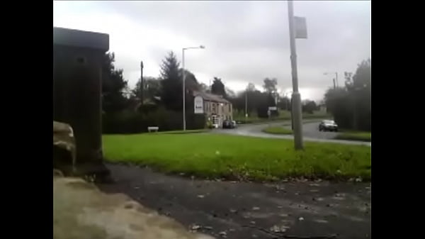 Waiting naked at a bus stop on busy road - public nudity