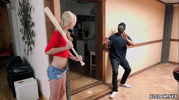 Tiny blonde ducking with black robber  