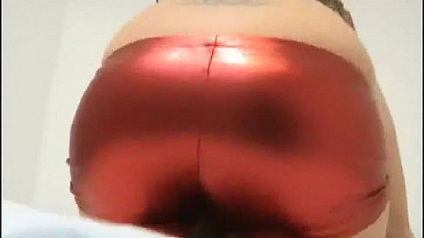 Cate teasing in nothing but shiny red PVC lingerie