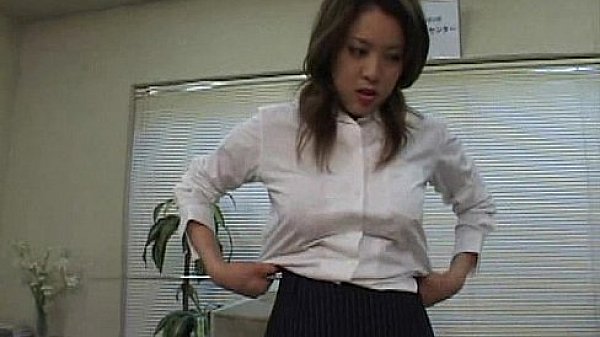Bored secretary exercises while teasing at the same time by licking her feet