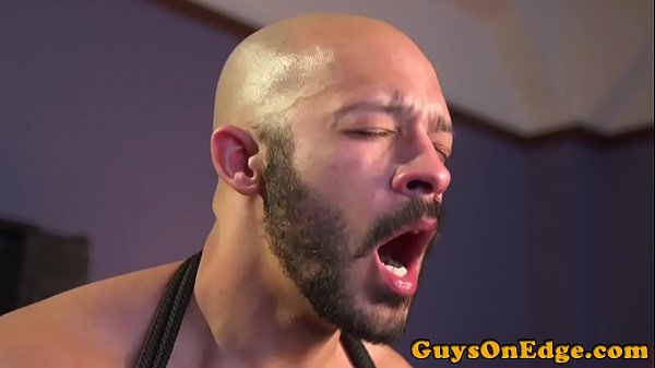 Restrained sub jerked until cumshot by dom  