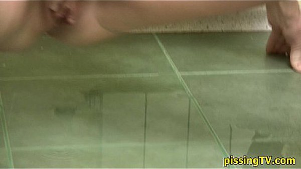 Hermione pisses in the kitchen