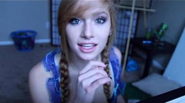 Blowjob on a fake penis