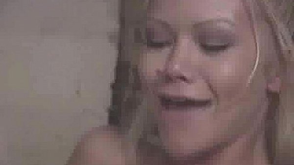 Busty blonde in washing area