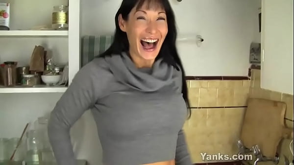 Sexy brunette milf with big boobs from Yanks Angela masturbating her pussy