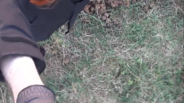 broke wearing female rubber mask and hunterboots outdoors  