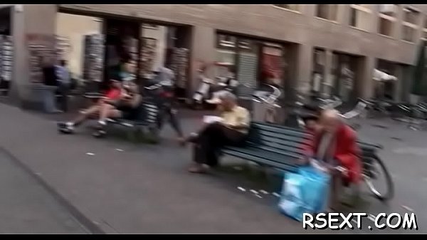 Cute chick sucks large pole