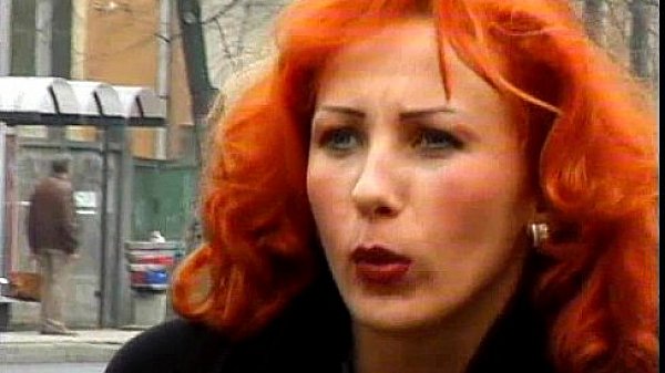 Mature redhead taking a piss in a public park  