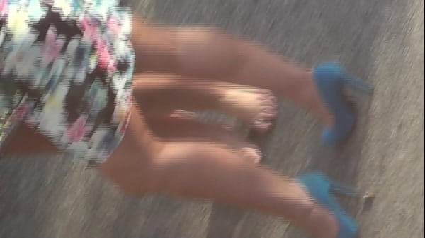 Candid women at a wedding pumps and shoes off  