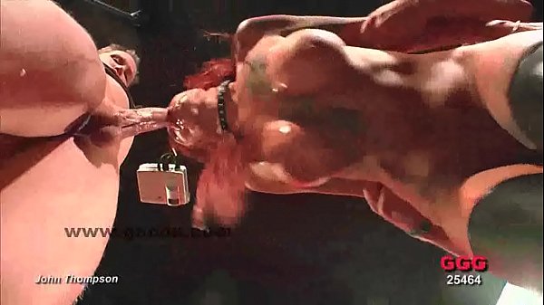 Redhead slut in latex boots