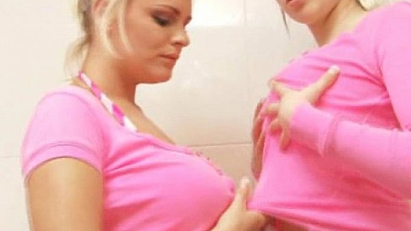 Busty blonde slut playing with her huge tits