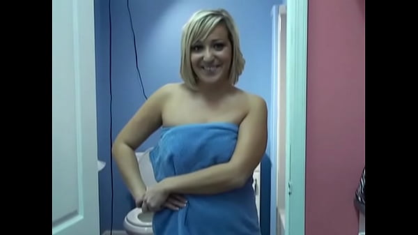 Blonde with a firm ass undresses and washes in the shower
