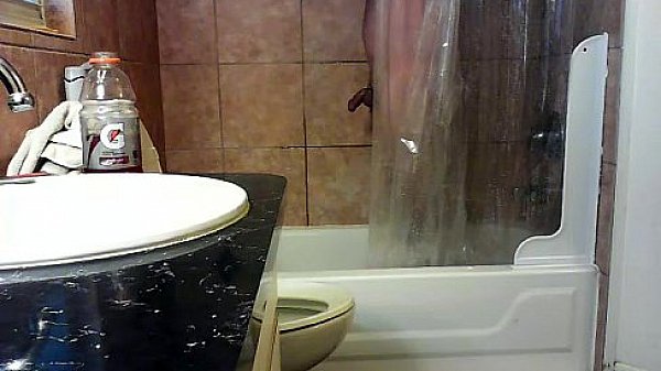 webcam shower on big screen of sorority house