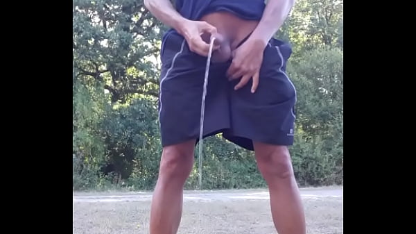 peeing on the edge of a path, pissing guy 