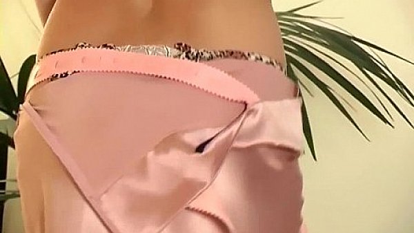 Babe teasing in nude stockings and high heels