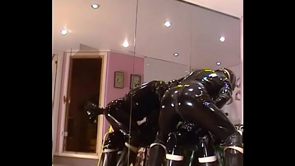 Roxina2003RubberCouple090303XL.MPG