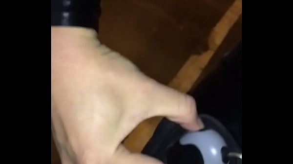 Rubber catsuit with electric shock