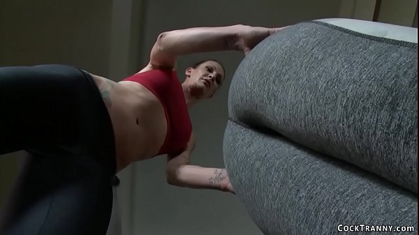 Fake boobs brunette shemale gym trainer Morgan Bailey brings hot redhead babe Ingrid Mouth in an office after training and anal fucks her 