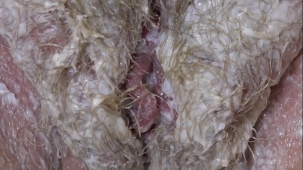 Mature BBW shaved a lot of hair from a plump cunt. Close-ups.  