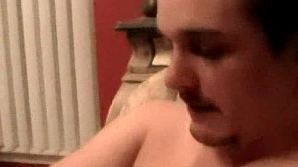Amateur hunk sucking and tugging on a hard cock 