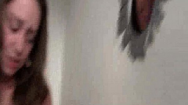 Brunette Sucking Two Cocks at GloryHole