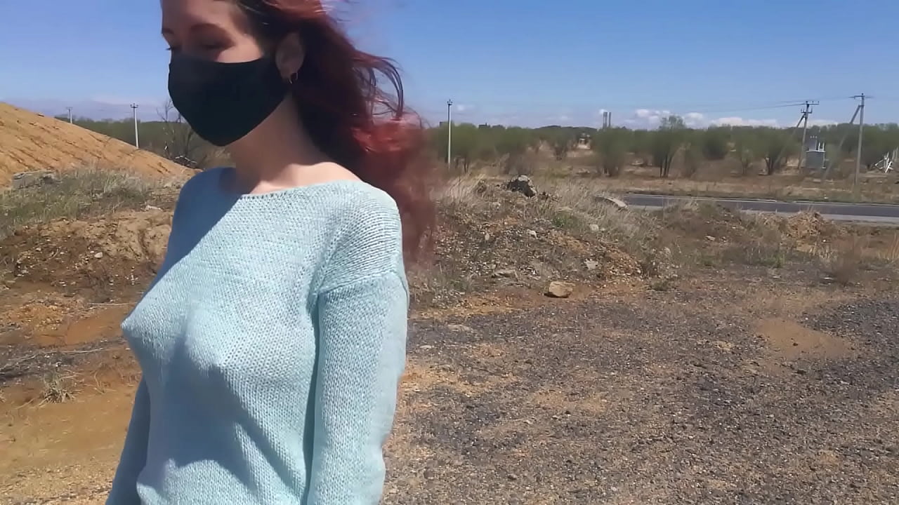 The girl was naked on the shore of the lake