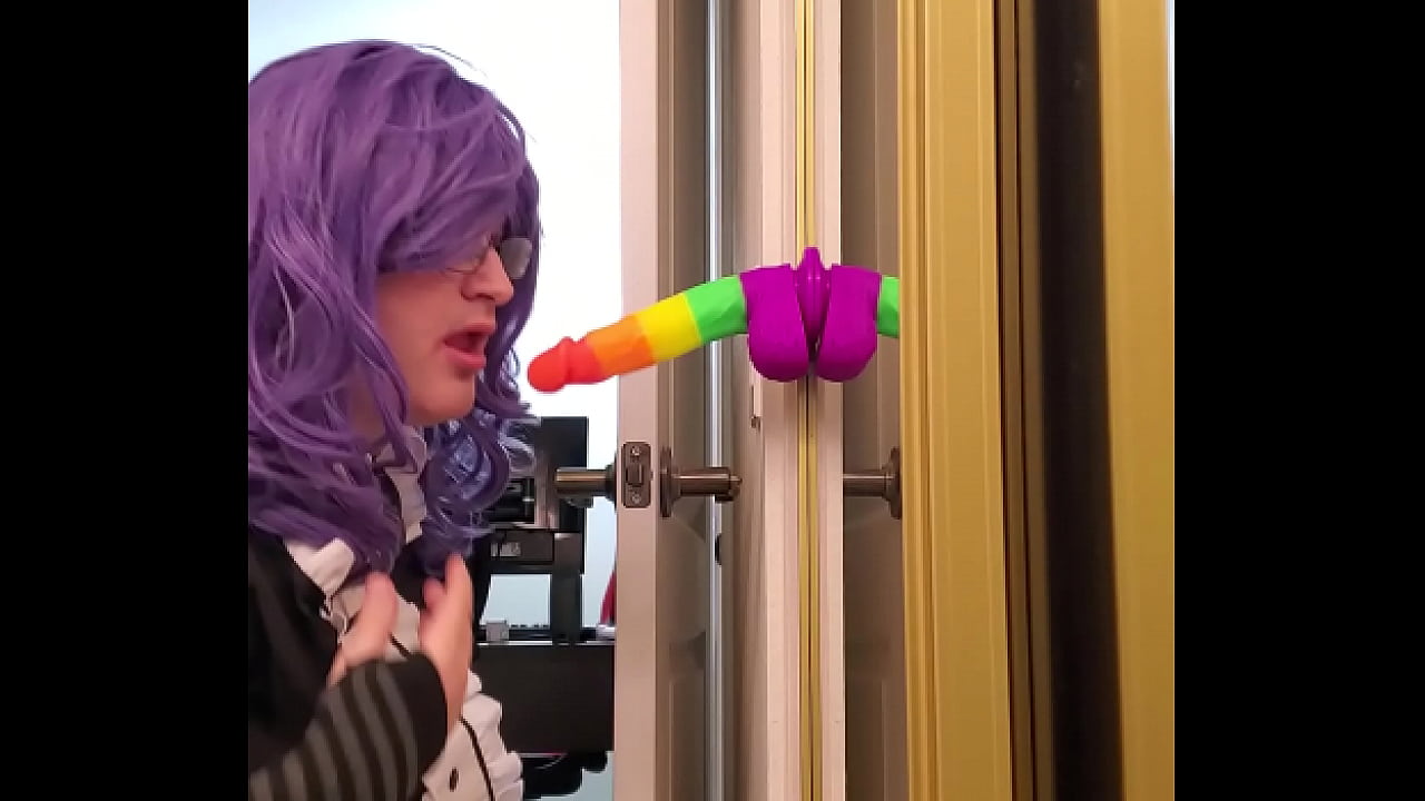 maid performing oral on a fake falus