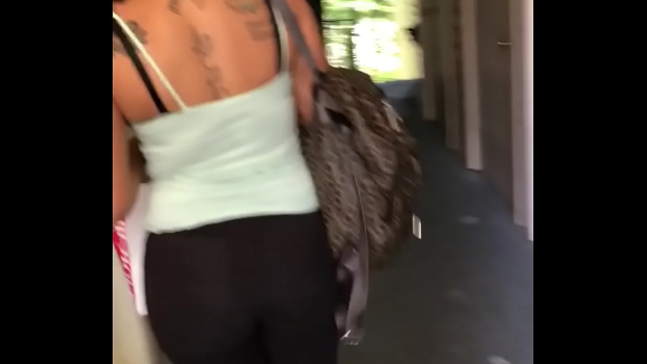Walking behind her