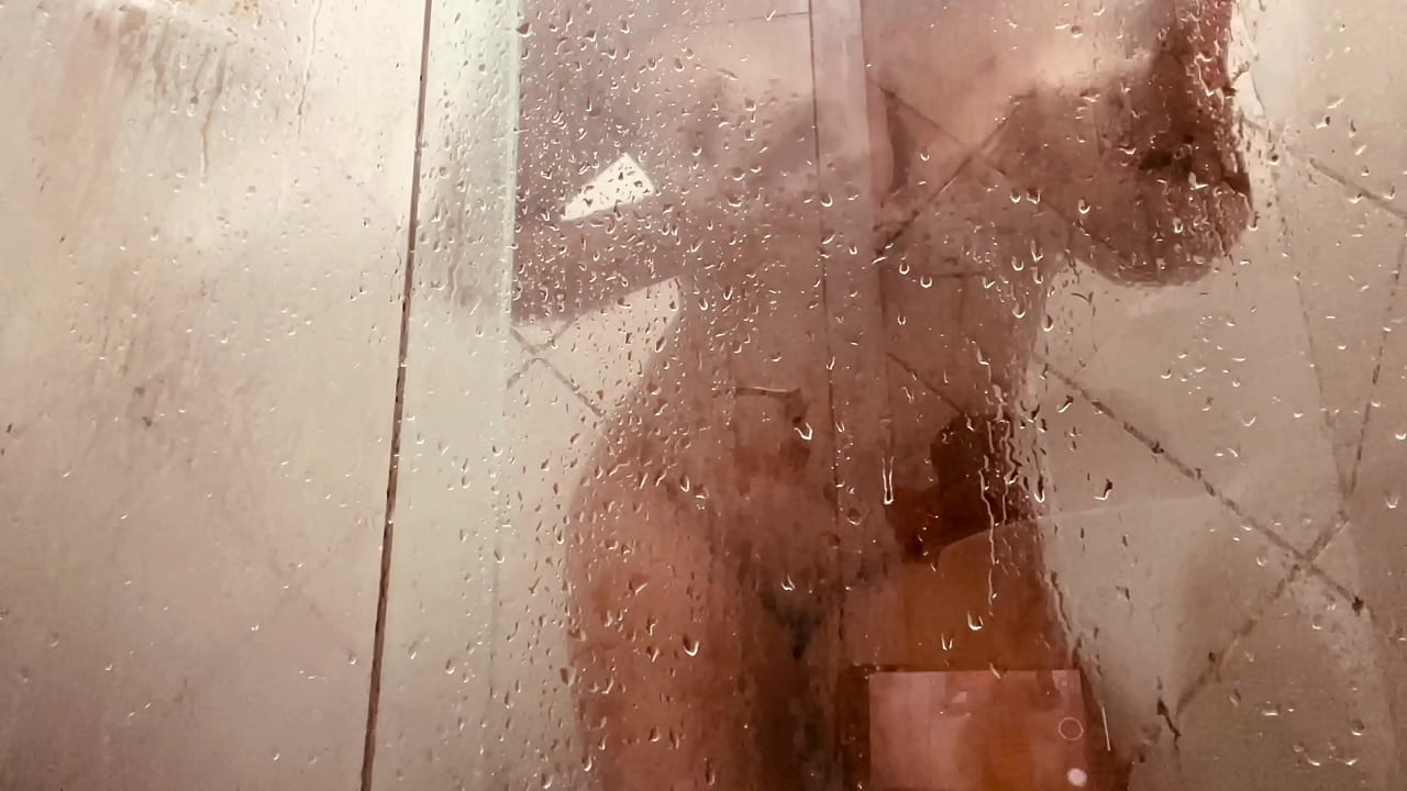 MILF Filming Herself Washing Her Hairy Pussy in the Bathroom