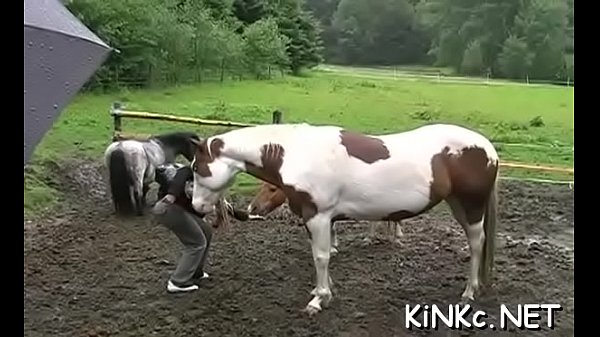 Dominatrix rides in nature's garb slave