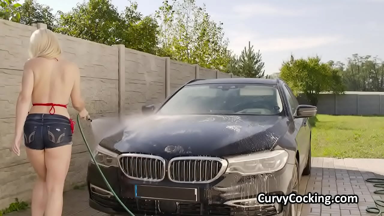 Blonde finishes soapy car wash on dick