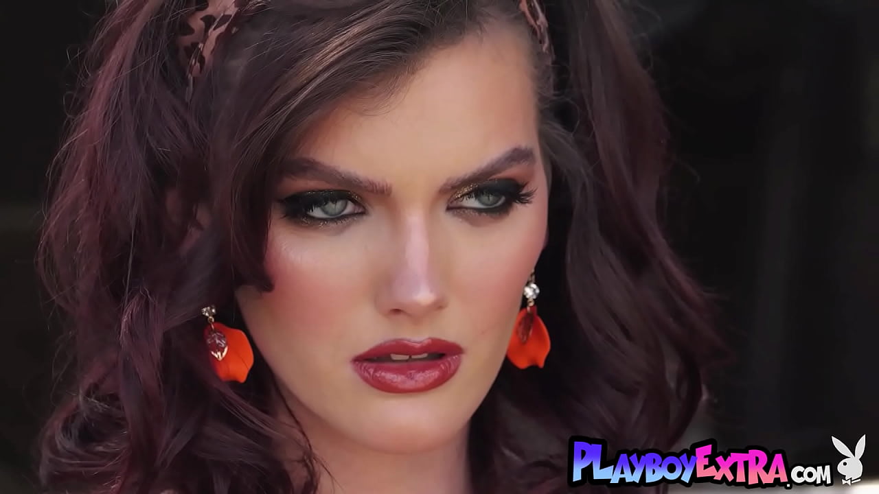 Smoking hot red cougar posing naked for Playboy outdoor