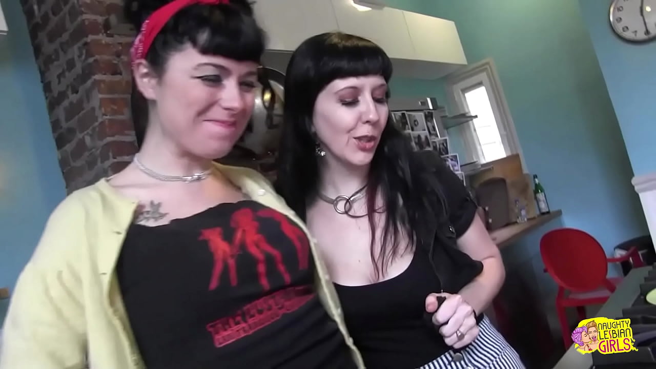 Two dark-haired goth females engage in various unconventional activities around the home