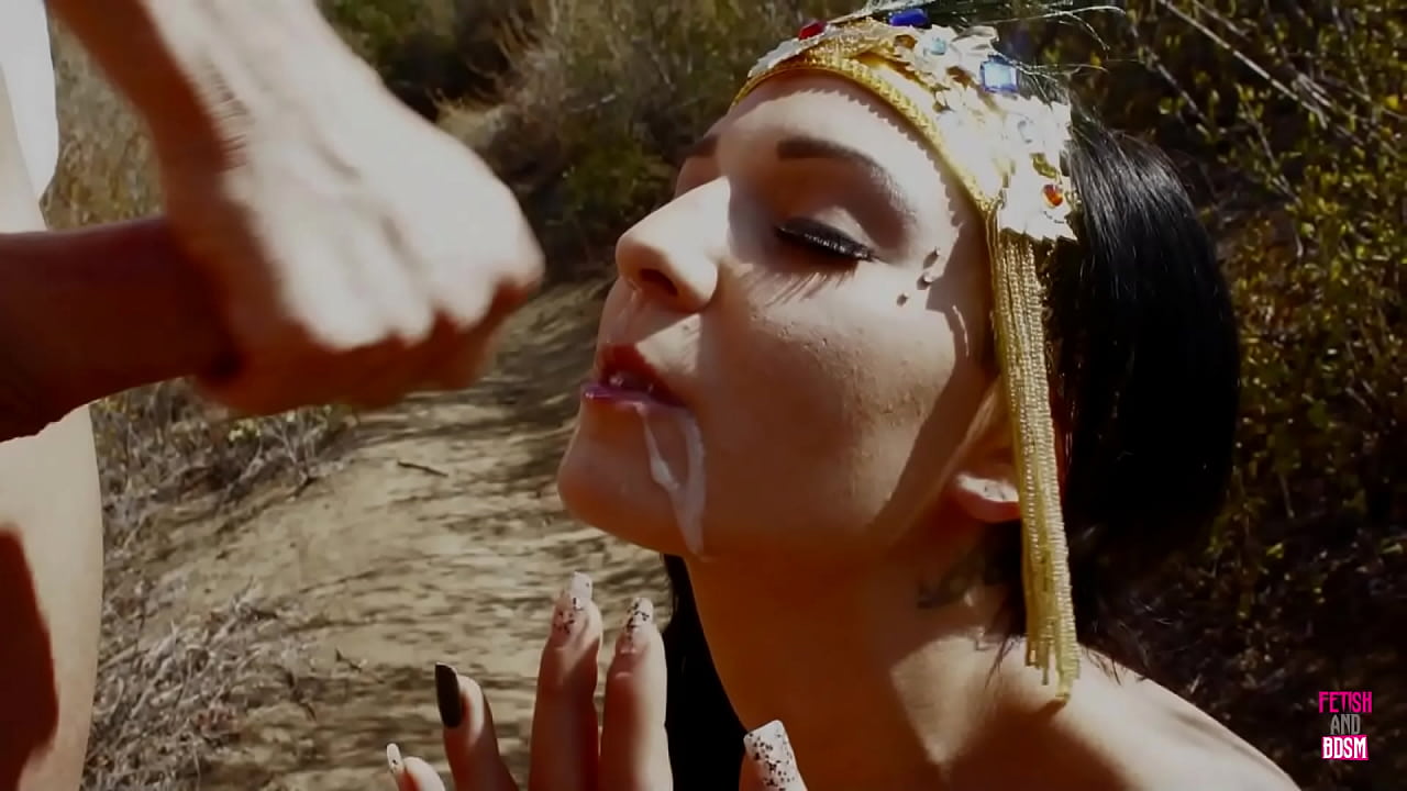 This amorous pair demonstrated their ardor for one another in an outdoor setting, far inside the expanse of a field