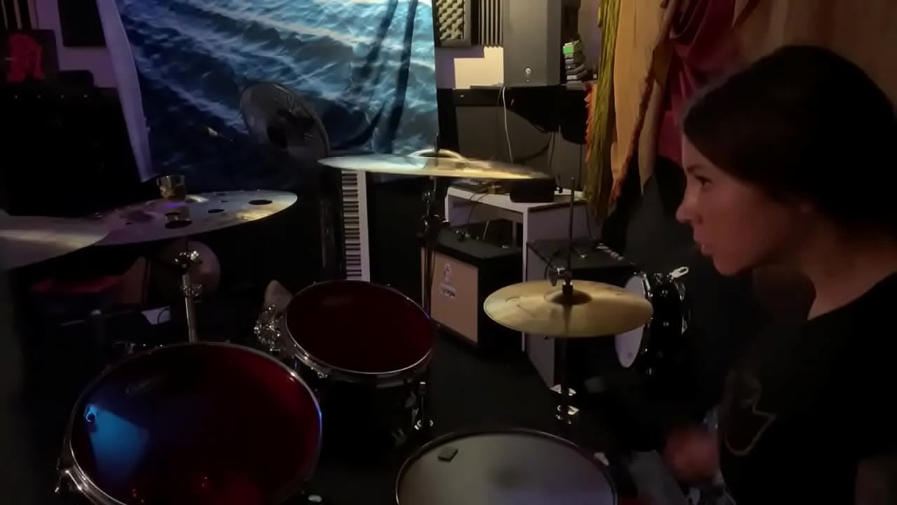 Metal drummer felicity rocks out