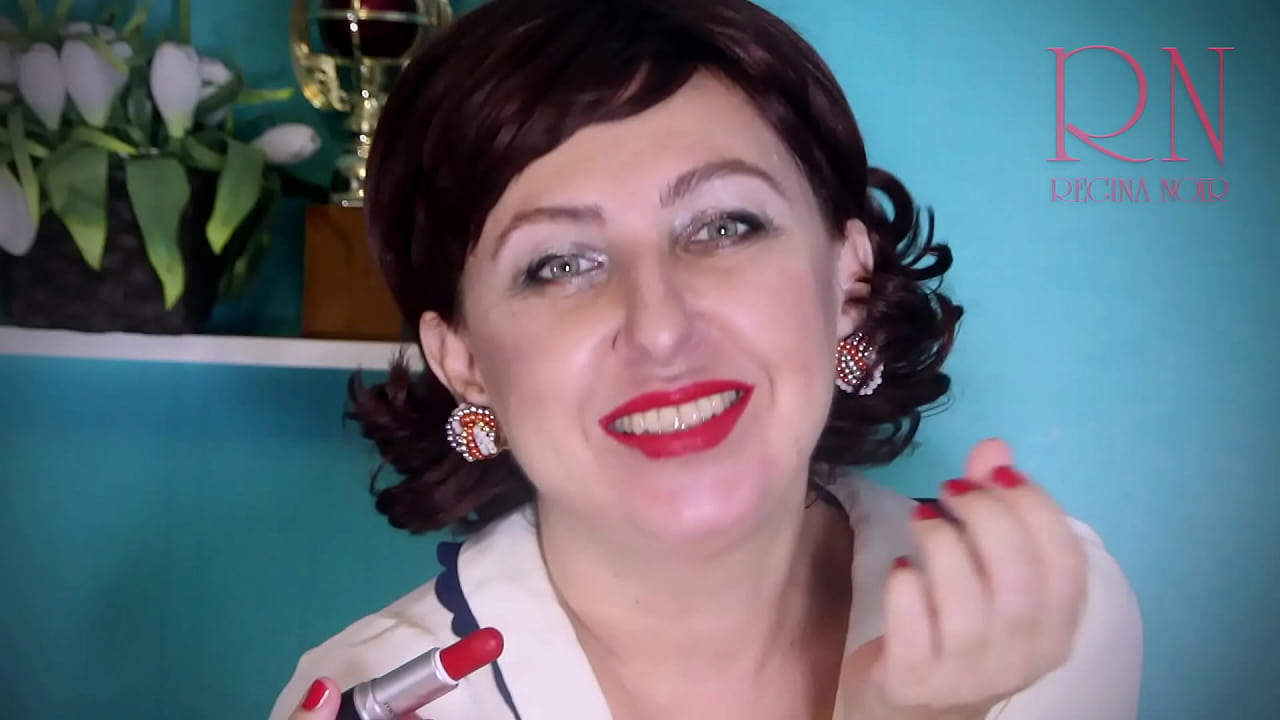 Red lipstick kissing Regina Noir teasing. I'm going to put on a red lipstick just for you. This one is actually called red. Are you ready for your lipstick kisses?