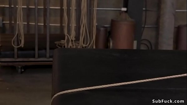 Hot flexible brunette slave Isabella Nice in back arch rope bondage gets whipped by black master