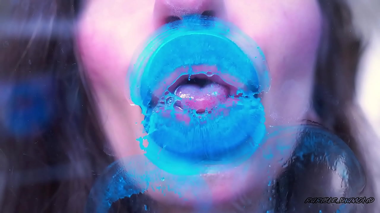 Wet red sticky lipgloss kiss