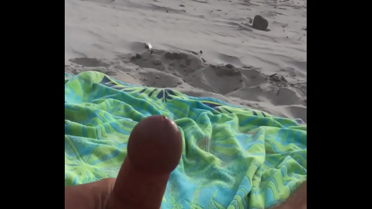 Throbing cock masterbate at a public beach!