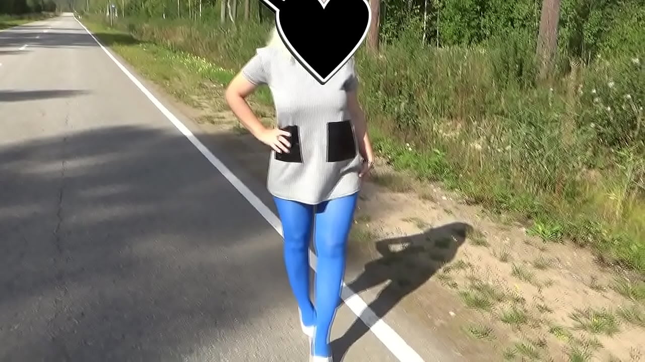 In a small dress with high heels, a walk