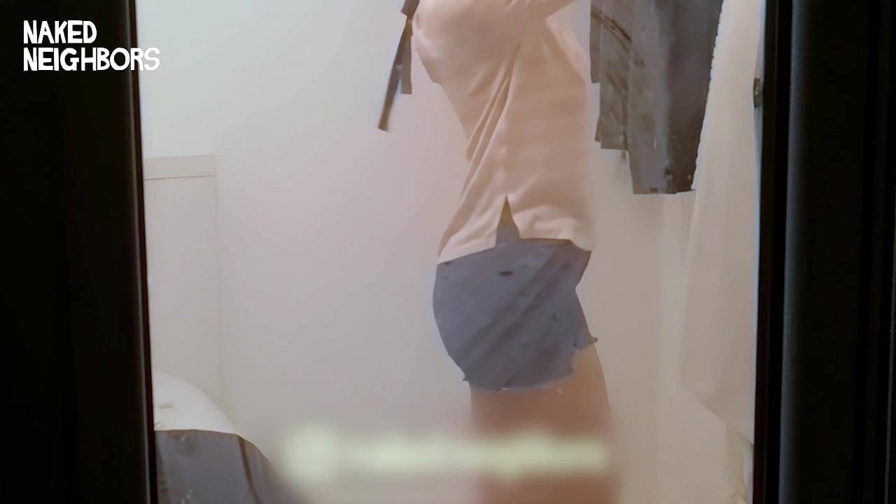 Caught girl through the window taking shower and wearing clothes