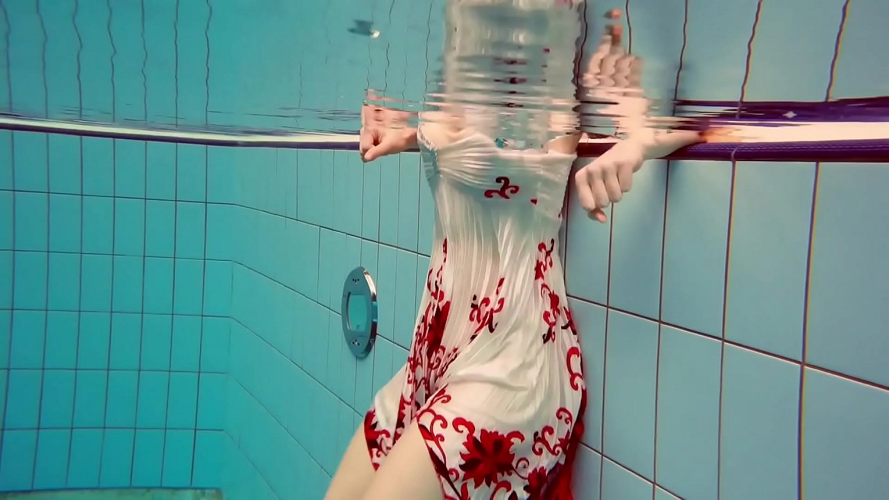 Polish babe Marketa gets wet in the pool