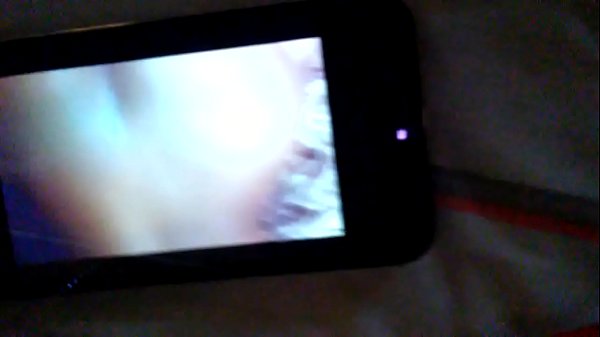 On the floor on her air mattress