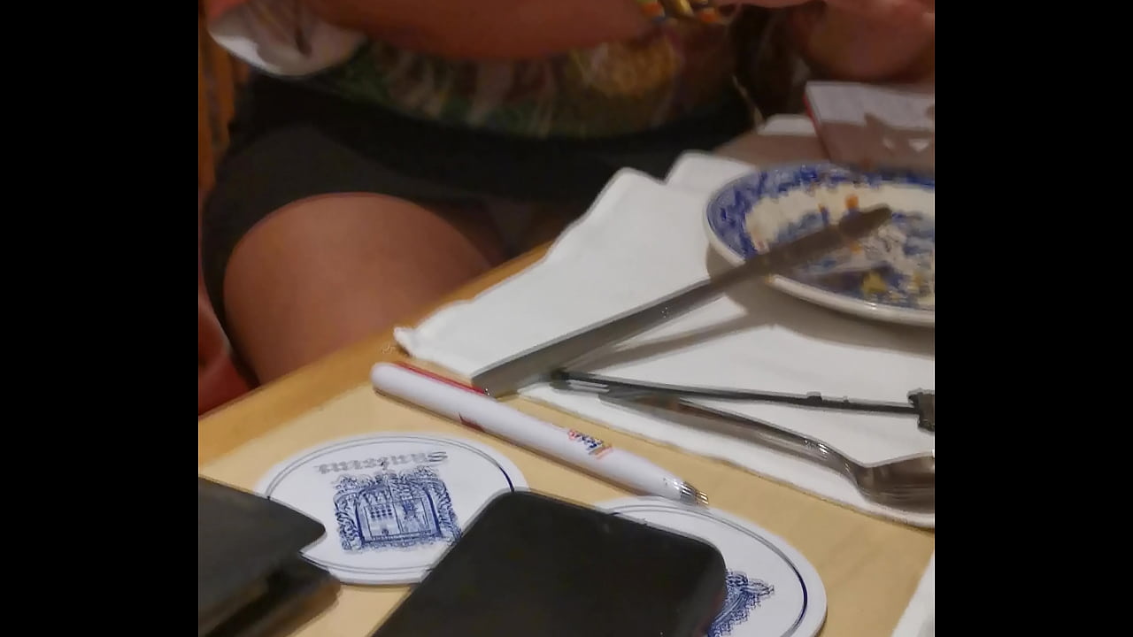 Flashing white panties in  a restaurant