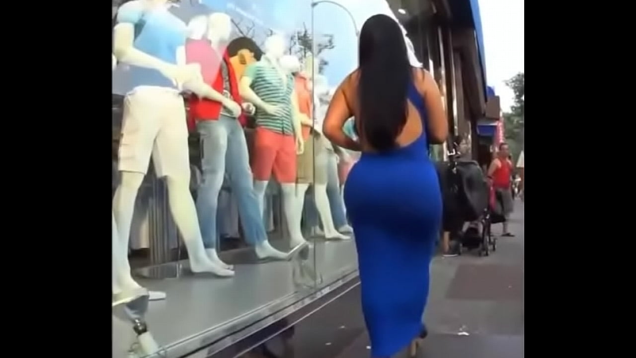 Ebony beauty with gorgeous ass walking on a street