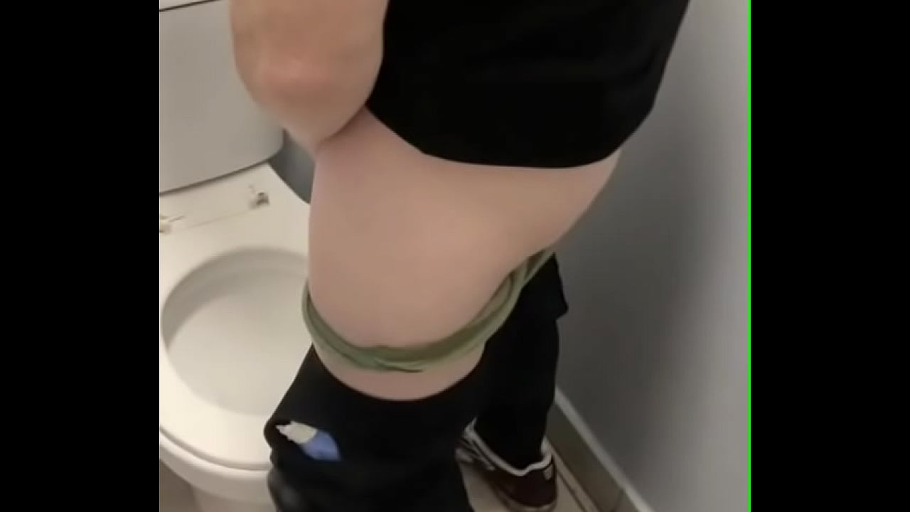 boy opens cubicle and catch his friend peeing (in a club's public toilets)